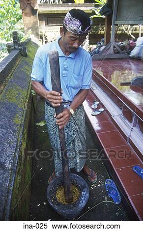 Man Using a Mortar and Pestle Petitenget Temple Seminyak Bali View Large Photo Image Stock Photography - Man Using a Mortar and Pestle Petitenget Temple Seminyak Bali. Fotosearch