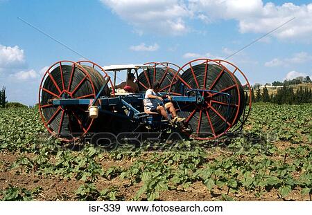 Man Using Large Agricultural Machine Israel View Large Photo Image Stock Photo - Man Using Large Agricultural Machine Israel. Fotosearch