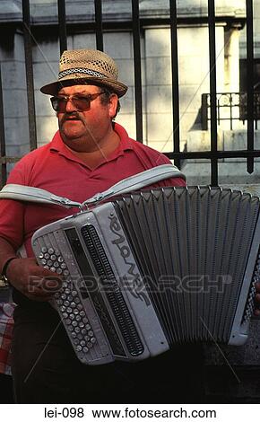 Man Wearing Hat and Sunglasses Playing Accordion View Large Photo Image Stock Photo - Man Wearing Hat and Sunglasses Playing Accordion. Fotosearch