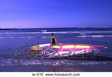 Man with Windsurfer at Waters Edge Tel Aviv Israel View Large Photo Image Stock Image - Man with Windsurfer at Waters Edge Tel Aviv Israel. Fotosearch
