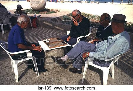 Men Playing Backgammon Outside Israel View Large Photo Image Stock Photo - Men Playing Backgammon Outside Israel. Fotosearch