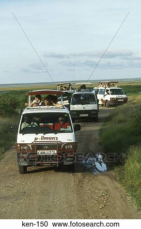 Stock Image - Minibuses on Safari Ambelosi National Reserve Kenya. Fotosearch
