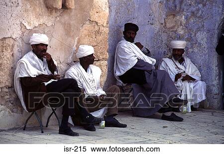 Stock Photography - Monks Sitting by Wall Ethiopian Compound Jerusalem. Fotosearch