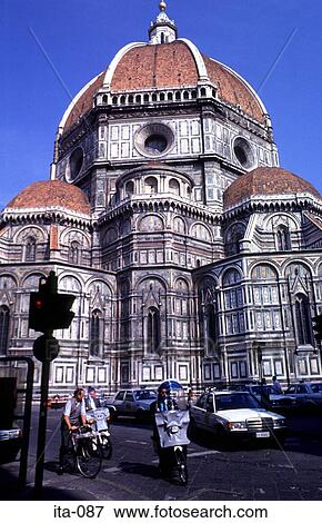 Stock Photo - Mopeds in front of Duomo Cathedral Florence Italy. Fotosearch