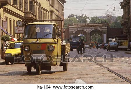 Old Three Wheeled Van on Milan Street Italy View Large Photo Image Picture - Old Three Wheeled Van on Milan Street Italy. Fotosearch