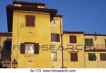Stock Image - Old Yellow Buildings Florence Italy Europe. Fotosearch