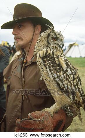Owl and Handler Tewkesbury Medieval Festival UK View Large Photo Image Stock Image - Owl and Handler Tewkesbury Medieval Festival UK. Fotosearch