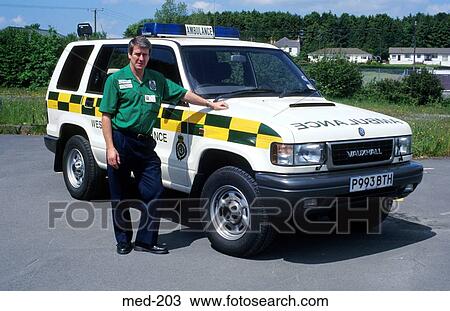 Paramedic by Ambulance UK View Large Photo Image Stock Image - Paramedic by Ambulance UK. Fotosearch