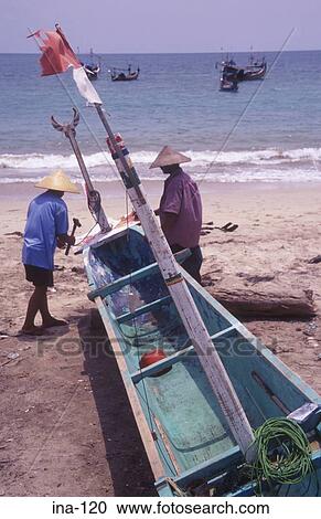 People Mending Boat on Kelan Beach Bali View Large Photo Image Stock Image - People Mending Boat on Kelan Beach Bali. Fotosearch