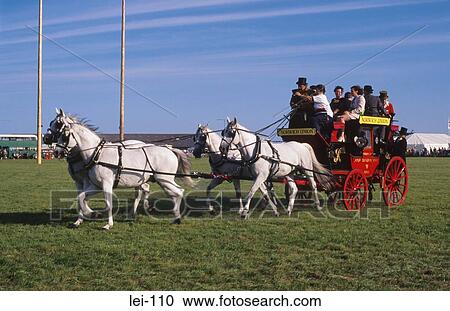 Stock Image - People Riding on Stage Coach. Fotosearch