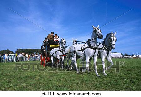 Stock Image - People Riding on Stage Coach. Fotosearch