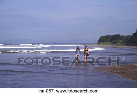 People Walking on Kuta Beach Bali View Large Photo Image Stock Photo - People Walking on Kuta Beach Bali. Fotosearch