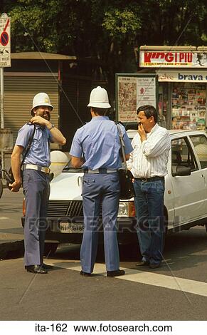 Policemen on a Milan Street Italy View Large Photo Image Stock Image - Policemen on a Milan Street Italy. Fotosearch