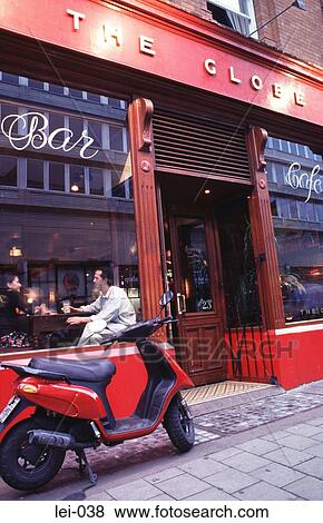 Red Scooter Outside Cafe Bar Ireland View Large Photo Image Stock Photo - Red Scooter Outside Cafe Bar Ireland. Fotosearch