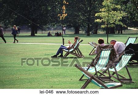 Relaxing in Deckchairs Hyde Park View Large Photo Image Stock Photograph - Relaxing in Deckchairs Hyde Park. Fotosearch