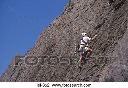 Rock Climber Three Cliffs Bay Wales UK View Large Photo Image Stock Image - Rock Climber Three Cliffs Bay Wales UK. Fotosearch