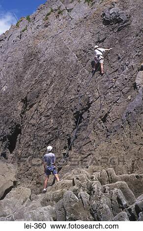 Rock Climbers Three Cliffs Bay Wales UK View Large Photo Image Stock Image - Rock Climbers Three Cliffs Bay Wales UK. Fotosearch