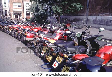 Picture - Row of Parked Motorcycles and Scooters London UK. Fotosearch