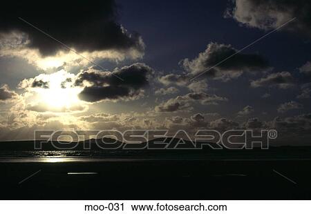 Scattered Clouds Silhouetted by Low Sun View Large Photo Image Stock Image - Scattered Clouds Silhouetted by Low Sun. Fotosearch