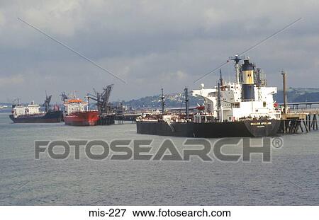 Shipping in Milford Haven Harbour Wales UK View Large Photo Image Stock Photo - Shipping in Milford Haven Harbour Wales UK. Fotosearch