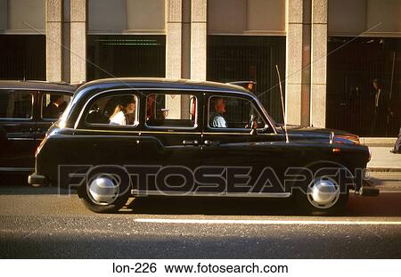 Side View of Cab with Woman Passenger London UK View Large Photo Image Stock Photograph - Side View of Cab with Woman Passenger London UK. Fotosearch
