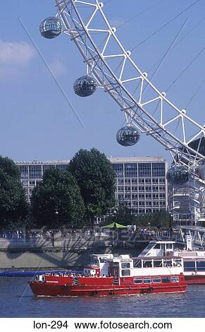 Sightseeing Boats and the London Eye London UK View Large Photo Image Picture - Sightseeing Boats and the London Eye London UK. Fotosearch