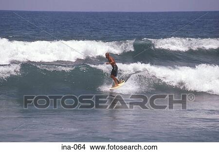 Surfer at Kuta Beach Bali View Large Photo Image Picture - Surfer at Kuta Beach Bali. Fotosearch
