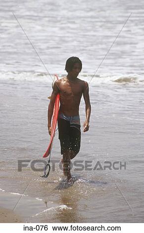 Surfer Carrying Surfboard Kuta Beach Bali View Large Photo Image Stock Photograph - Surfer Carrying Surfboard Kuta Beach Bali. Fotosearch