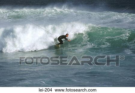 Surfer in Action Ireland View Large Photo Image Picture - Surfer in Action Ireland. Fotosearch