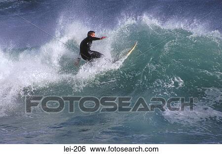 Surfer in Action Ireland View Large Photo Image Stock Photograph - Surfer in Action Ireland. Fotosearch
