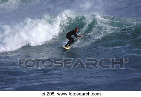 Stock Photography - Surfer in Action Ireland. Fotosearch