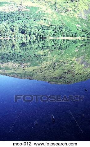 Trees and Hillside Reflected in Lake Wales UK View Large Photo Image Stock Image - Trees and Hillside Reflected in Lake Wales UK. Fotosearch