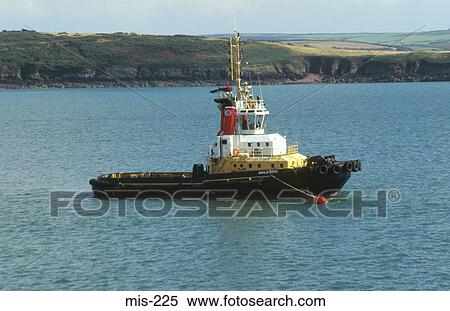 Tugboat at Sea Wales UK View Large Photo Image Stock Photography - Tugboat at Sea Wales UK. Fotosearch
