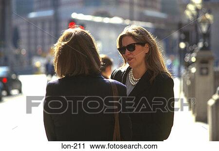 Two Businesswomen in Conversation London UK View Large Photo Image Stock Image - Two Businesswomen in Conversation London UK. Fotosearch