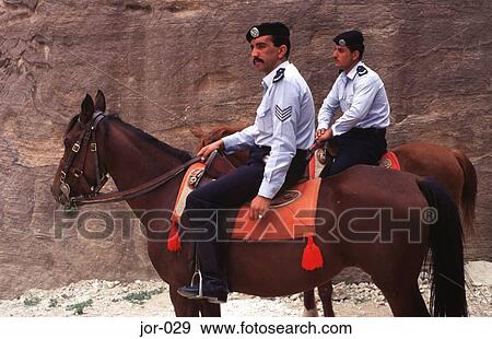 Stock Photo - Two Mounted Policemen Petra Jordan. Fotosearch
