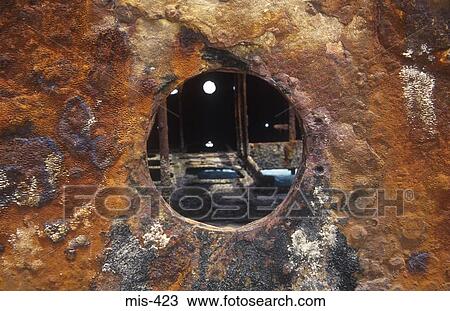 View through Hole in Rusty Metal View Large Photo Image Stock Image - View through Hole in Rusty Metal. Fotosearch