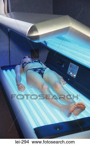 Woman on Sunbed UK View Large Photo Image Picture - Woman on Sunbed UK. Fotosearch
