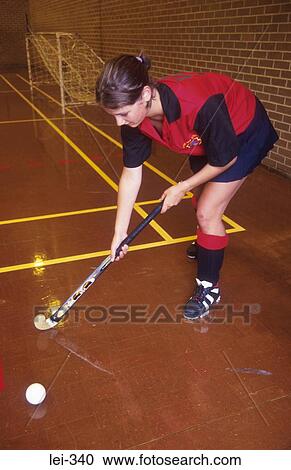 Woman Playing Hockey Leisure View Large Photo Image Stock Image - Woman Playing Hockey Leisure. Fotosearch