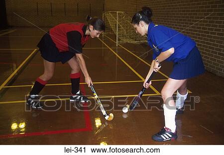 Women Playing Hockey Leisure View Large Photo Image Stock Image - Women Playing Hockey Leisure. Fotosearch