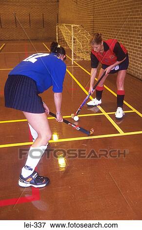 Women Playing Hockey Leisure View Large Photo Image Stock Photo - Women Playing Hockey Leisure. Fotosearch