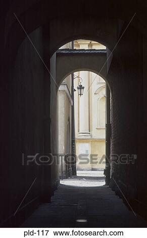 Stock Photo - Arched Passage Warsaw Old Town Poland. Fotosearch