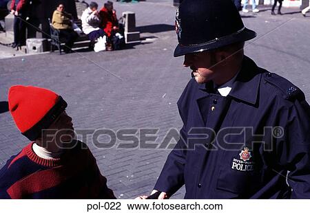 Boy and Policeman Talking Wales UK View Large Photo Image Stock Image - Boy and Policeman Talking Wales UK. Fotosearch