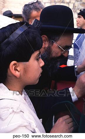 Stock Image - Boy and Rabbi Jerusalem Israel. Fotosearch