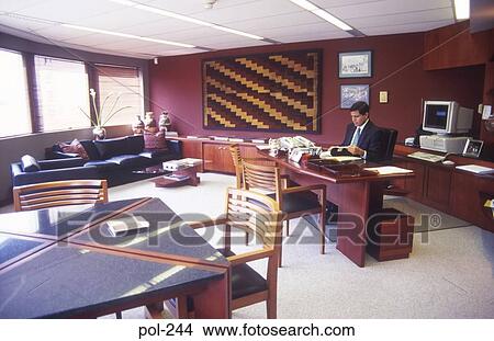 Businessman Working in Large Office Peru View Large Photo Image Picture - Businessman Working in Large Office Peru. Fotosearch