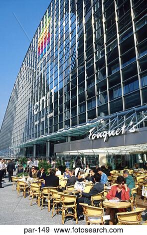 Busy Pavement Cafe by Modern Glass Building Paris View Large Photo Image Stock Photo - Busy Pavement Cafe by Modern Glass Building Paris. Fotosearch
