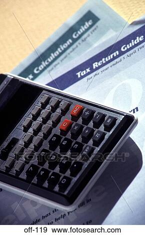 Stock Photo - Calculator and Tax Forms. Fotosearch