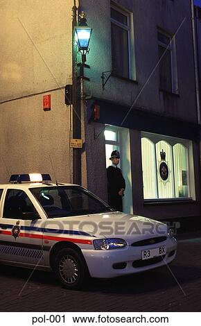 Car and Policeman in front of Station at Night UK View Large Photo Image Stock Image - Car and Policeman in front of Station at Night UK. Fotosearch