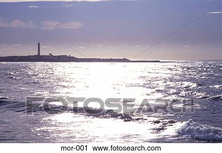 Stock Image - Casablanca Silhouetted Against Sea Morocco. Fotosearch