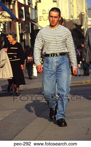 Stock Image - Casually Dressed Man on UK Street. Fotosearch