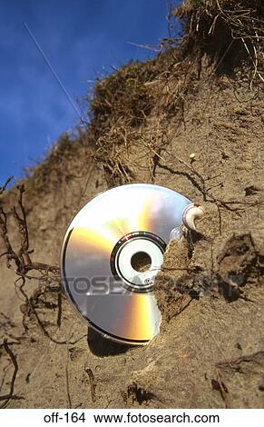 CD ROM in Sand Bank View Large Photo Image Picture - CD ROM in Sand Bank. Fotosearch